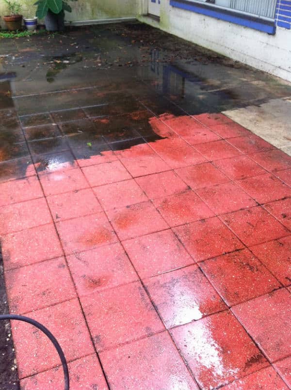 Pressure Washer Uses Tile Patio